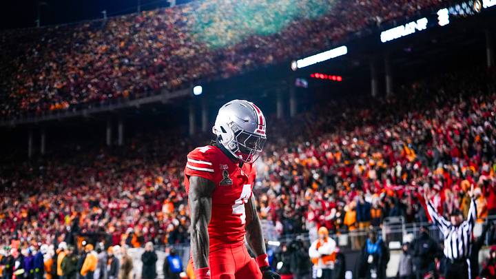 Ohio State Buckeyes wide receiver Jeremiah Smith (4) reacts after scoring a touchdown in the first half at Ohio Stadium on Saturday, Dec. 21, 2024 in Columbus, Ohio.