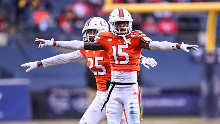 Dec 28, 2023; Bronx, NY, USA; Miami Hurricanes defensive back Markeith Williams (15) and defensive back Jadais Richard (25) react to a missed field goal by Rutgers Scarlet Knights during the second quarter at Yankee Stadium. Mandatory Credit: Mark Smith-Imagn Images