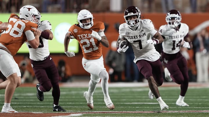 Nov 28, 2025; Austin, Texas, USA; Texas A&M Aggies wide receiver KC Concepcion (7) returns a punt during the first half against the Texas Longhorns at Darrell K Royal-Texas Memorial Stadium. Mandatory Credit: Scott Wachter-Imagn Images