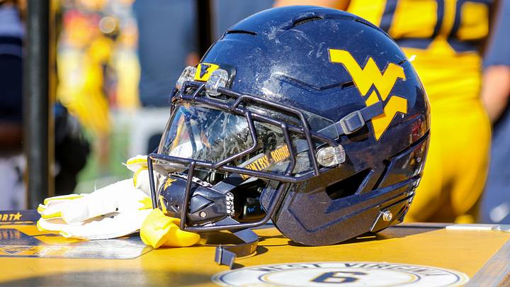 Aug 30, 2025; Morgantown, West Virginia, USA; A West Virginia Mountaineers football helmet is seen along the sidelines during the fourth quarter against the Robert Morris Colonials at Milan Puskar Stadium. Mandatory Credit: Ben Queen-Imagn Images Aug 30, 2025; Morgantown, West Virginia, USA; A West Virginia Mountaineers football helmet is seen along the sidelines during the fourth quarter against the Robert Morris Colonials at Milan Puskar Stadium. Mandatory Credit: Ben Queen-Imagn Images