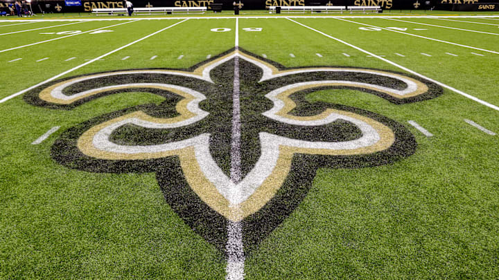 Oct 30, 2022; New Orleans, Louisiana, USA;  General view of the New Orleans Saints logo as the midfield logo fleur-de-lis after the game between the New Orleans Saints and the Las Vegas Raiders at Caesars Superdome. Mandatory Credit: Stephen Lew-Imagn Images
