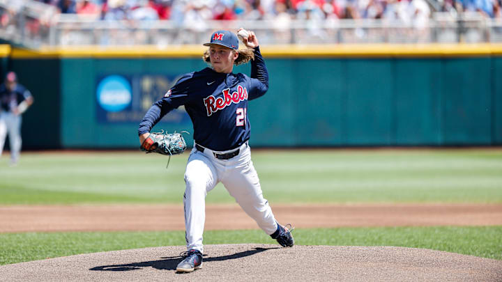 Jun 26, 2022; Omaha, NE, USA; Ole Miss pitcher Hunter Elliott (26) pitches during the first inning against the Oklahoma Sooners at Charles Schwab Field. Mandatory Credit: Jaylynn Nash-Imagn Images