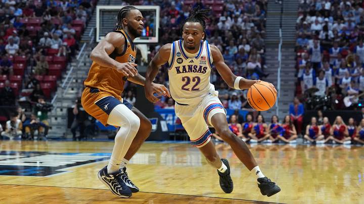 Mar 20, 2026; San Diego, CA, USA; Kansas Jayhawks guard Darryn Peterson (22) controls the ball against California Baptist Lancers guard Martel Williams (33) in the first half during a first round game of the men's 2026 NCAA Tournament at Viejas Arena. Mandatory Credit: Kirby Lee-Imagn Images Mar 20, 2026; San Diego, CA, USA; Kansas Jayhawks guard Darryn Peterson (22) controls the ball against California Baptist Lancers guard Martel Williams (33) in the first half during a first round game of the men's 2026 NCAA Tournament at Viejas Arena. Mandatory Credit: Kirby Lee-Imagn Images