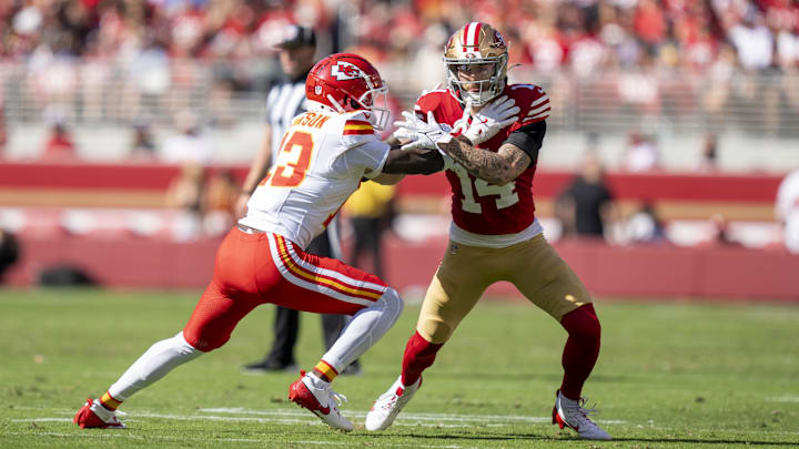 October 20, 2024; Santa Clara, California, USA; San Francisco 49ers wide receiver Ricky Pearsall (14) runs against Kansas City Chiefs safety Nazeeh Johnson (13) during the first quarter at Levi's Stadium. Mandatory Credit: Kyle Terada-Imagn Images