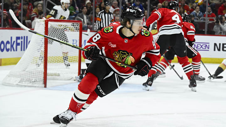 Jan 18, 2025; Chicago, Illinois, USA;  Chicago Blackhawks center Connor Bedard (98) skates against the Vegas Golden Knights during the first period at United Center. Mandatory Credit: Matt Marton-Imagn Images