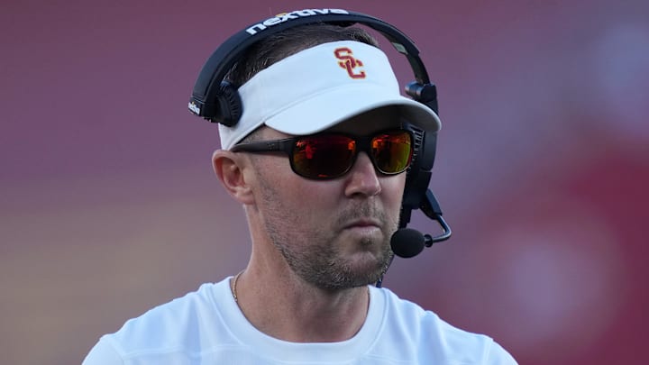 Oct 21, 2023; Los Angeles, California, USA; Southern California Trojans head coach Lincoln Riley watches from the sidelines against the Utah Utes in the first half at United Airlines Field at Los Angeles Memorial Coliseum. Mandatory Credit: Kirby Lee-Imagn Images