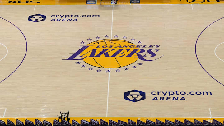 Dec 18, 2023; Los Angeles, California, USA; The Los Angeles Lakers logo at center court at the Crypto.com Arena. Mandatory Credit: Kirby Lee-Imagn Images Dec 18, 2023; Los Angeles, California, USA; The Los Angeles Lakers logo at center court at the Crypto.com Arena. Mandatory Credit: Kirby Lee-Imagn Images