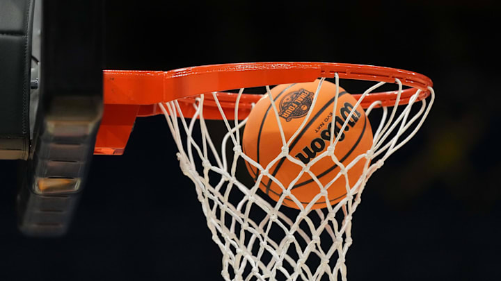 A Wilson EVO Nxt basketball ball with the 2025 NCAA Women's Final Four logo approaches the rim and the net at Amalie Arena. A Wilson EVO Nxt basketball ball with the 2025 NCAA Women's Final Four logo approaches the rim and the net at Amalie Arena.