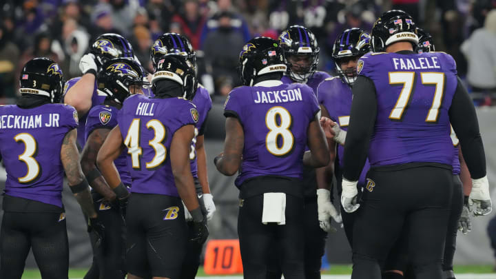 Jan 20, 2024; Baltimore, MD, USA; Baltimore Ravens quarterback Lamar Jackson (8) huddles with the Ravens offense before running a play against the Houston Texans during the second quarter of a 2024 AFC divisional round game at M&T Bank Stadium. Mandatory Credit: Mitch Stringer-USA TODAY Sports