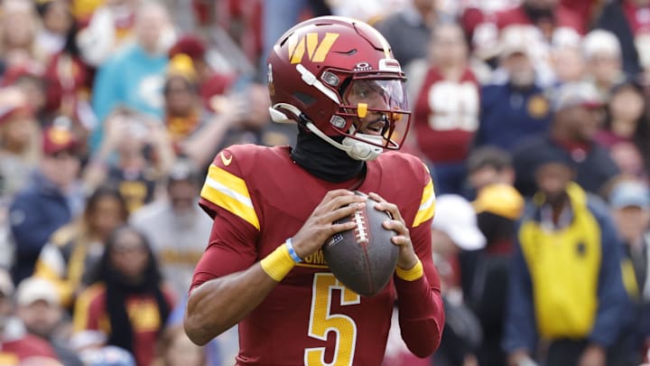 Nov 10, 2024; Landover, Maryland, USA; Washington Commanders quarterback Jayden Daniels (5) prepares to throw the ball against the Pittsburgh Steelers during the first half at Northwest Stadium. Mandatory Credit: Amber Searls-Imagn Images