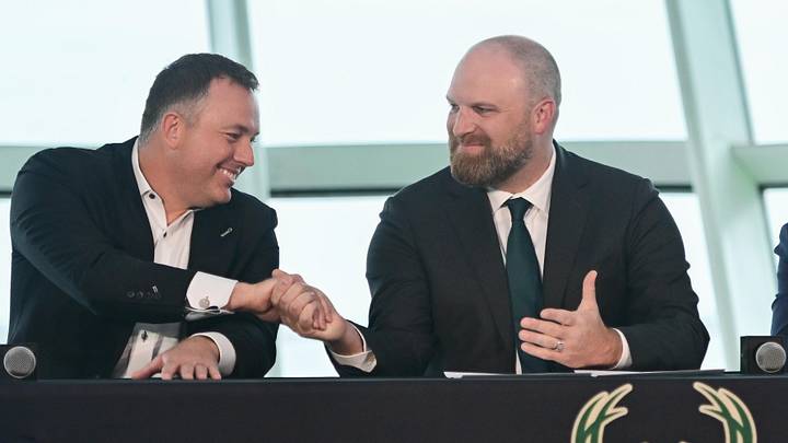 May 6, 2026; Milwaukee, WI, USA;  Milwaukee Bucks general manager Jon Horst (left) introduces new head coach Taylor Jenkins (right) at a press conference at Milwaukee Art Museum. Mandatory Credit: Benny Sieu-Imagn Images