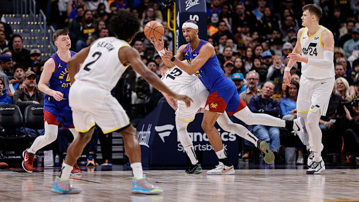 Mar 9, 2024; Denver, Colorado, USA; Denver Nuggets forward Zeke Nnaji (22) looks to pass the ball