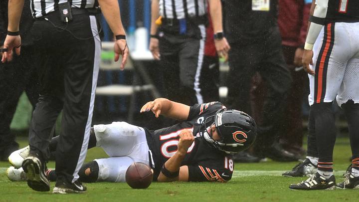 Chicago Bears quarterback Caleb Williams (18) lies on the field with an apparent injury against the Minnesota Vikings during the second half at Soldier Field. Mandatory Credit: Patrick Gorski-Imagn Images Chicago Bears quarterback Caleb Williams (18) lies on the field with an apparent injury against the Minnesota Vikings during the second half at Soldier Field. Mandatory Credit: Patrick Gorski-Imagn Images