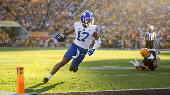 Nov 23, 2024; Tempe, Arizona, USA; Brigham Young Cougars wide receiver Keelan Marion (17) scores a touchdown against the Arizona State Sun Devils at Mountain America Stadium. Mandatory Credit: Mark J. Rebilas-Imagn Images