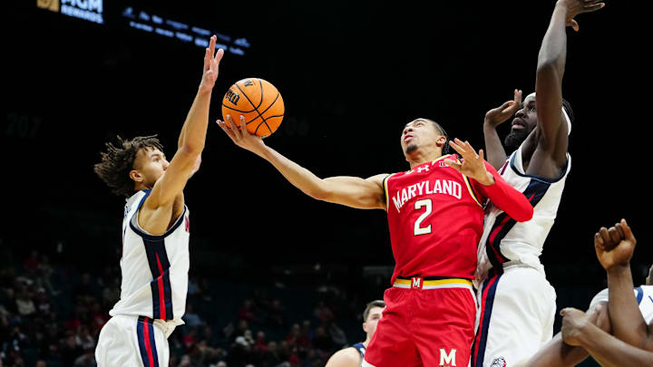 Nov 25, 2025; Las Vegas, NV, USA;Maryland Terrapins guard Myles Rice (2) shoots between Gonzaga Bulldogs guard Jalen Warley (8) and forward Graham Ike (15) in the second half in a 2025 Players Era Festival group play game at MGM Grand Garden Arena. Mandatory Credit: Stephen R. Sylvanie-Imagn Images