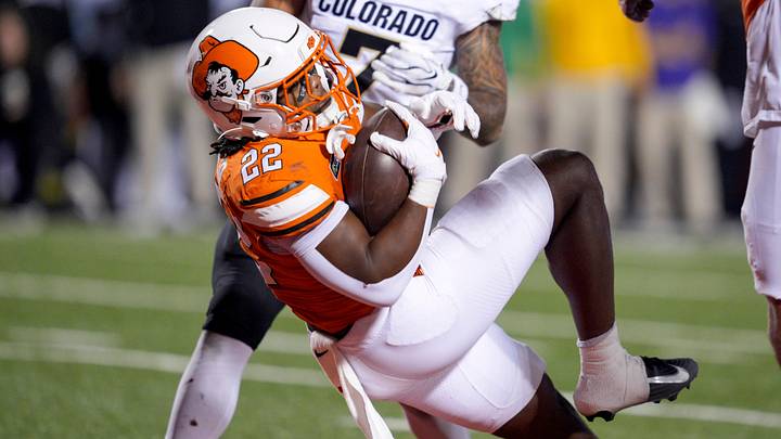 Oklahoma State Cowboys running back William Mason. Oklahoma State Cowboys running back William Mason.
