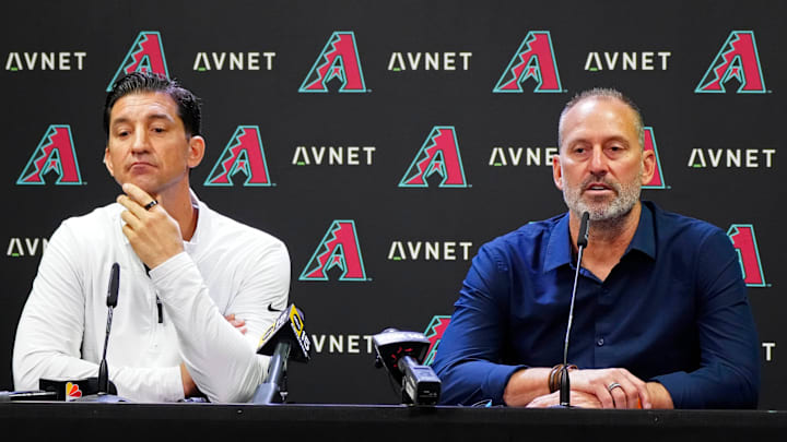 Diamondbacks head coach Torey Lovullo (right) speaks to the media the day with GM Mike Hazen (left) after the team was eliminated from playoff contention at Chase Field in Phoenix on Oct. 1, 2024.