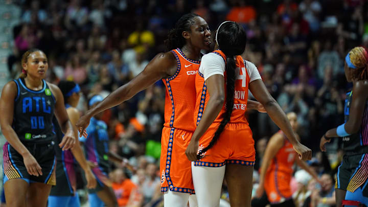 Jun 6, 2025; Uncasville, Connecticut, USA; Connecticut Sun center Tina Charles (31) and forward Aneesah Morrow (24) react after a play against the Atlanta Dream in the second half at Mohegan Sun Arena.