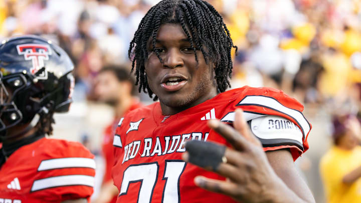 Texas Tech Red Raiders EDGE David Bailey reacts as he walks off the field following the game against the ASU Sun Devils.