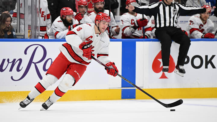 Feb 22, 2025; Toronto, Ontario, CAN;  Carolina Hurricanes forward Mikko Rantanen (96) skates with the puck against the Toronto Maple Leafs in the third period at Scotiabank Arena. Mandatory Credit: Dan Hamilton-Imagn Images
