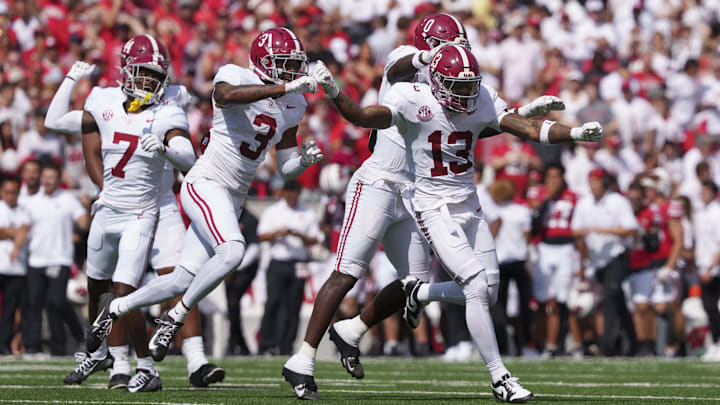 Sep 14, 2024; Madison, Wisconsin, USA;  Alabama Crimson Tide defensive back Malachi Moore (13) celebrates following a Wisconsin Badgers fumble during the second quarter at Camp Randall Stadium. Mandatory Credit: Jeff Hanisch-Imagn Images