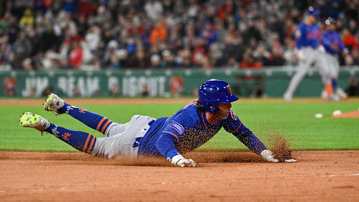 May 19, 2025; Boston, Massachusetts, USA; New York Mets second baseman Jeff McNeil (1) slides into third base against the Boston Red Sox during the seventh inning at Fenway Park. Mandatory Credit: Eric Canha-Imagn Images May 19, 2025; Boston, Massachusetts, USA; New York Mets second baseman Jeff McNeil (1) slides into third base against the Boston Red Sox during the seventh inning at Fenway Park. Mandatory Credit: Eric Canha-Imagn Images