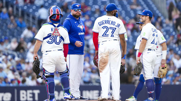 May 15, 2025; Toronto, Ontario, CAN; Toronto Blue Jays manager John Schneider (14) looks on against the Tampa Bay Rays during the sixth inning at Rogers Centre.