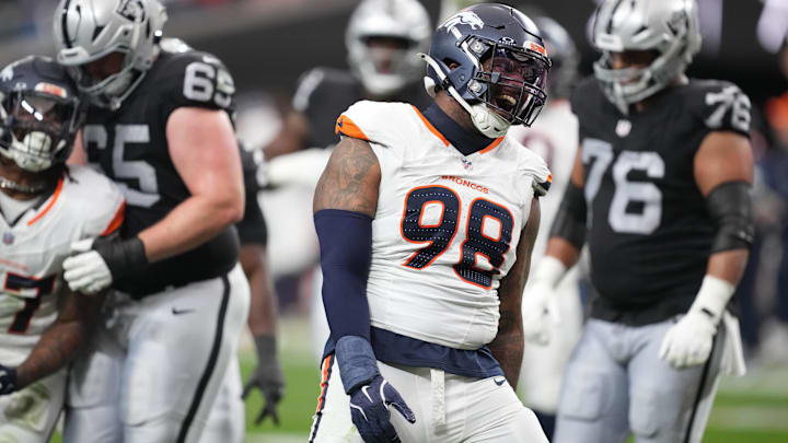 Dec 7, 2025; Paradise, Nevada, USA;  Denver Broncos defensive end John Franklin-Myers (98) reacts after a sack against the Las Vegas Raiders during the first half at Allegiant Stadium. Mandatory Credit: Kirby Lee-Imagn Images