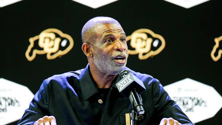 Jul 7, 2026; Frisco, TX, USA; Colorado head coach Deion Sanders speaks to reporters during Big 12 Conference Football Media Days at The Star. Mandatory Credit: Raymond Carlin III-Imagn Images Jul 7, 2026; Frisco, TX, USA; Colorado head coach Deion Sanders speaks to reporters during Big 12 Conference Football Media Days at The Star. Mandatory Credit: Raymond Carlin III-Imagn Images