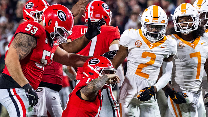 Carson Beck runs for a first down vs Tennessee