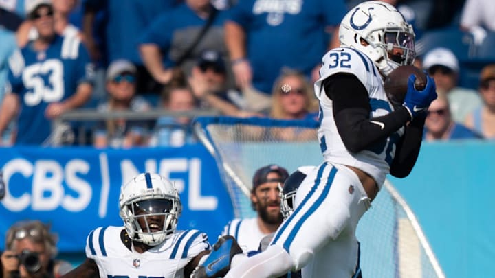Indianapolis Colts safety Julian Blackmon (32) intercepts a pass intended for Tennessee Titans wide receiver Calvin Ridley (0) in the fourth quarter of their game at Nissan Stadium in Nashville, Tenn., Monday, Oct. 14, 2024.