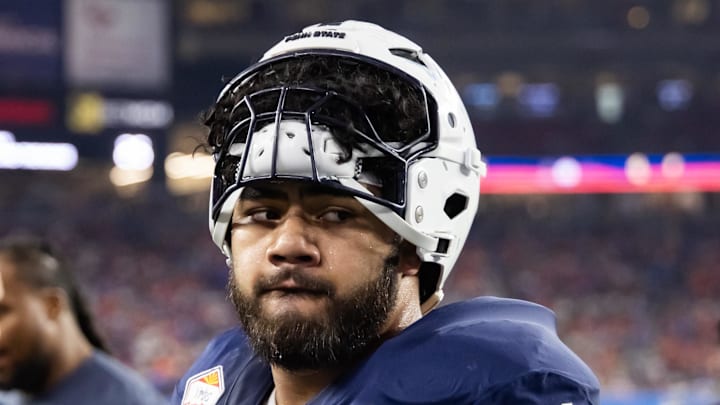 Dec 31, 2024; Glendale, AZ, USA; Penn State Nittany Lions offensive lineman Olaivavega Ioane (71) against the Boise State Broncos during the Fiesta Bowl at State Farm Stadium. Dec 31, 2024; Glendale, AZ, USA; Penn State Nittany Lions offensive lineman Olaivavega Ioane (71) against the Boise State Broncos during the Fiesta Bowl at State Farm Stadium.