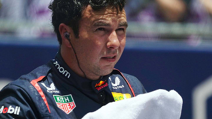 May 4, 2024; Miami Gardens, Florida, USA; Red Bull Racing driver Sergio Perez (11) reacts on the grid after the F1 Sprint Race at Miami International Autodrome. Mandatory Credit: John David Mercer-USA TODAY Sports
