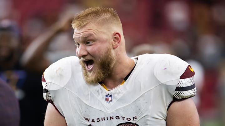 Sep 29, 2024; Glendale, Arizona, USA; Washington Commanders center Tyler Biadasz (63) against the Arizona Cardinals at State Farm Stadium. Mandatory Credit: Mark J. Rebilas-Imagn Images