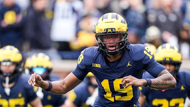 Team Blue quarterback Bryce Underwood warms up before the first half of the spring game at Michigan Stadium in Ann Arbor on Saturday, April 19, 2025.