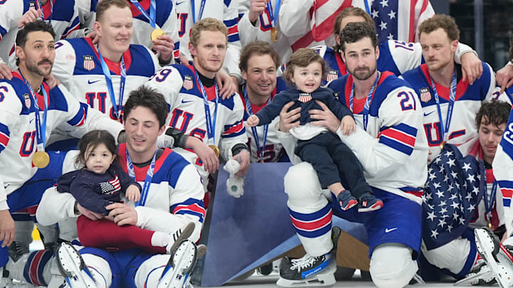 Team USA celebrates the gold medal win with Johnny Gaudreau’s children on the ice. Team USA celebrates the gold medal win with Johnny Gaudreau’s children on the ice.