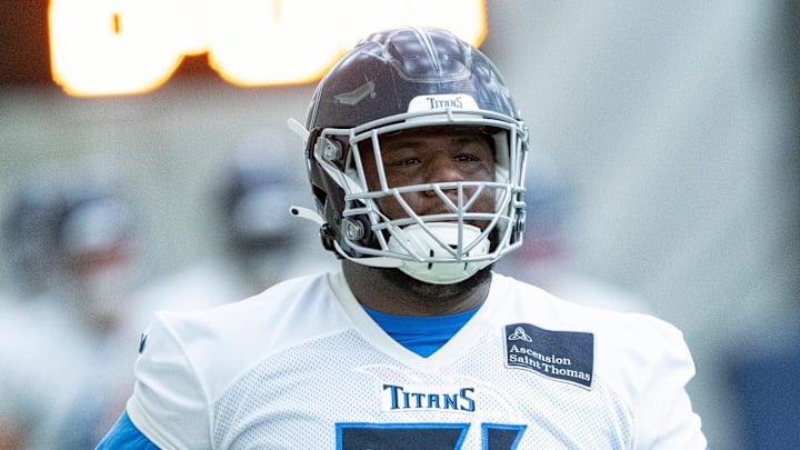 Defensive lineman Keondre Coburn (91) runs through drills during the Tennessee Titans mandatory mini-camp at Ascension Saint Thomas Sports Park in Nashville, Tenn., Tuesday, June 4, 2024.