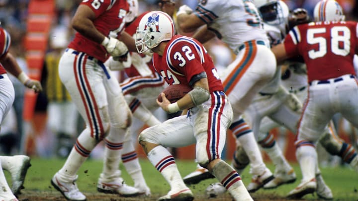 Jan 12, 1986; Miami, FL, USA; FILE PHOTO; A New England Patriots running back Craig James (32) during the 1985 AFC Conference Championship against the Miami Dolphins at the Orange Bowl. The Patriots won 31-14. Mandatory Credit: Manny Rubio-Imagn Images