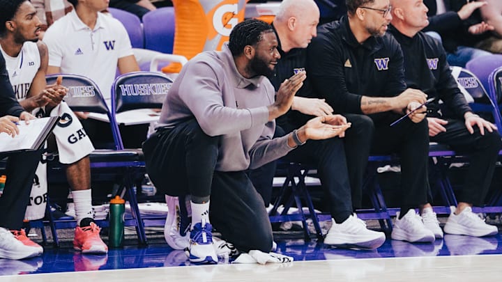 Injured or not, Franck Kepnang stays engaged with UW basketball. 