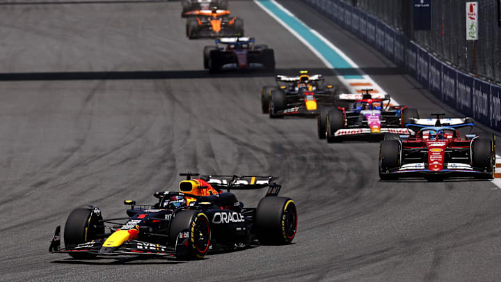 May 4, 2024; Miami Gardens, Florida, USA; Red Bull Racing driver Max Verstappen (1) lead the field into turn one during the F1 Sprint Race at Miami International Autodrome. Mandatory Credit: Peter Casey-Imagn Images
