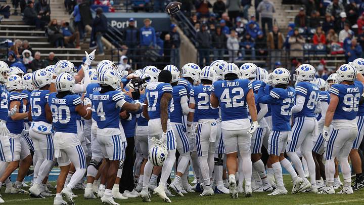 Nov 18, 2023; Provo, Utah, USA; The Brigham Young Cougars huddle up before the game against the Oklahoma Sooners at LaVell Edwards Stadium. Mandatory Credit: Rob Gray-Imagn Images