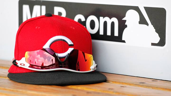 Aug 2, 2017; Pittsburgh, PA, USA; A Cincinnati Reds hat and glasses are seen in the dugout before a game between the Reds and the Pittsburgh Pirates at PNC Park. Mandatory Credit: Charles LeClaire-USA TODAY Sports