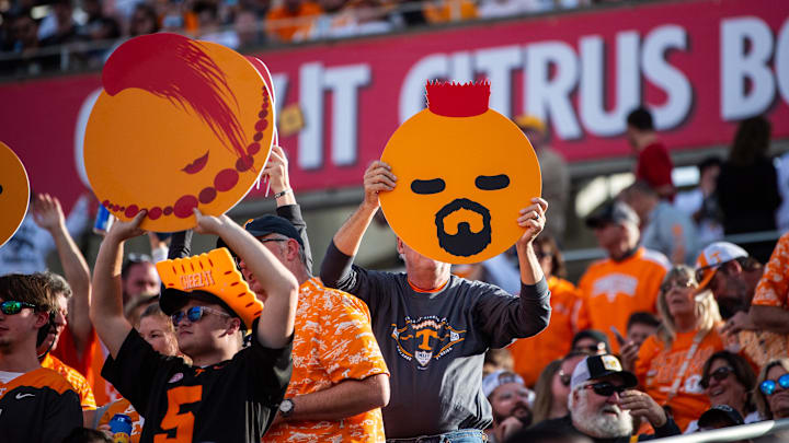 Jan 1, 2024; Orlando, FL, USA; Tennessee Volunteer fans cheering against the Iowa Hawkeyes in the third quarter at Camping World Stadium. Mandatory Credit: Jeremy Reper-USA TODAY Sports Jan 1, 2024; Orlando, FL, USA; Tennessee Volunteer fans cheering against the Iowa Hawkeyes in the third quarter at Camping World Stadium. Mandatory Credit: Jeremy Reper-USA TODAY Sports