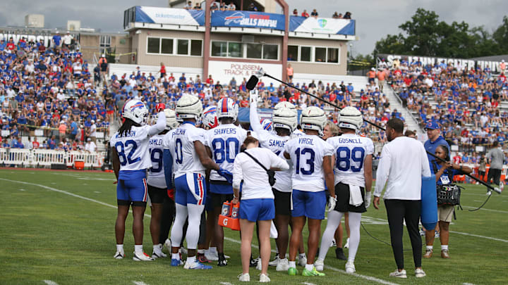 The Bills wide receiver unit huddle up at the end of position drills during day three of Buffalo Bills training camp at St. John Fisher University Friday, July 25, 2025 in Pittsford, NY.