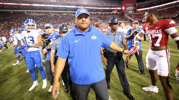 Sep 16, 2023; Fayetteville, Arkansas, USA; BYU Cougars head coach Kalani Sitake celebrates after the game against the Arkansas Razorbacks at Donald W. Reynolds Razorback Stadium. BYU won 38-31. Mandatory Credit: Nelson Chenault-USA TODAY Sports Sep 16, 2023; Fayetteville, Arkansas, USA; BYU Cougars head coach Kalani Sitake celebrates after the game against the Arkansas Razorbacks at Donald W. Reynolds Razorback Stadium. BYU won 38-31. Mandatory Credit: Nelson Chenault-USA TODAY Sports