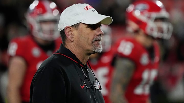 Georgia Offensive Coordinator Mike Bobo looks on during warm ups before the start of a NCAA college football game against Georgia Tech in Athens, Ga., on Friday, Nov. 29, 2024.