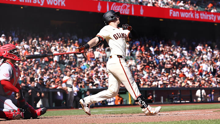 San Francisco, California, USA; San Francisco Giants right fielder Mike Yastrzemski (5) hits a two-run RBI home run for a walk-off win against the Cincinnati Reds during the tenth inning at Oracle Park. San Francisco, California, USA; San Francisco Giants right fielder Mike Yastrzemski (5) hits a two-run RBI home run for a walk-off win against the Cincinnati Reds during the tenth inning at Oracle Park.