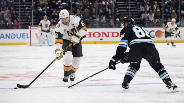 Apr 27, 2026; Salt Lake City, Utah, USA; Vegas Golden Knights right wing Mark Stone (61) plays the puck against Utah Mammoth defenseman Nate Schmidt (88) during overtime in game four of the first round of the 2026 Stanley Cup Playoffs at Delta Center. Mandatory Credit: Rob Gray-Imagn Images