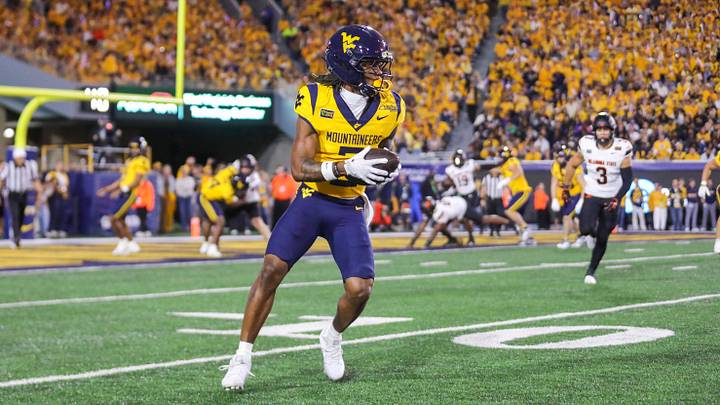 Sep 26, 2026; Morgantown, West Virginia, USA; West Virginia Mountaineers wide receiver DJ Epps (2) catches a pass during the first quarter against the Oklahoma State Cowboys at Milan Puskar Stadium. Mandatory Credit: Ben Queen-Imagn Images Sep 26, 2026; Morgantown, West Virginia, USA; West Virginia Mountaineers wide receiver DJ Epps (2) catches a pass during the first quarter against the Oklahoma State Cowboys at Milan Puskar Stadium. Mandatory Credit: Ben Queen-Imagn Images