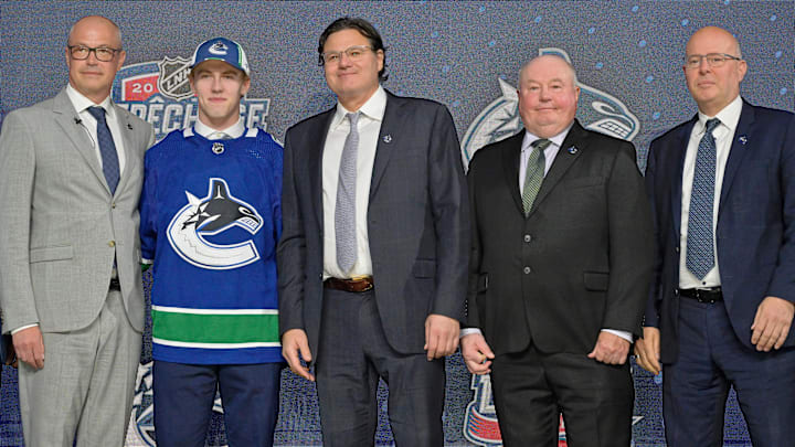 Jul 7, 2022; Montreal, Quebec, CANADA; Jonathan Lekkerimaki after being selected as the number fifteen overall pick to the Vancouver Canucks in the first round of the 2022 NHL Draft at Bell Centre. Mandatory Credit: Eric Bolte-USA TODAY Sports